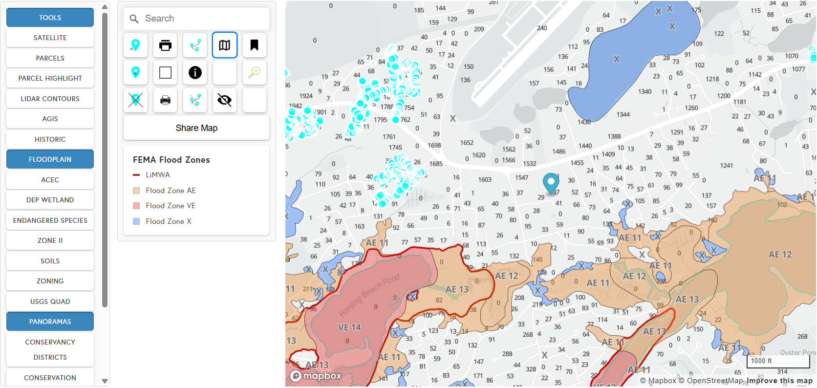 The GIS map open on a Cape Cod town, showing FEMA flood zones and parcel boundaries beside the tools panel and the town's layer list.